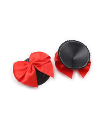Paire de cache tétons adhésifs noir avec nœud papillon rouge 